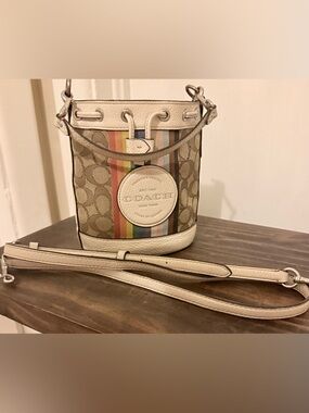 Mini Dempsey Bucket Bag In Signature Jacquard Leather